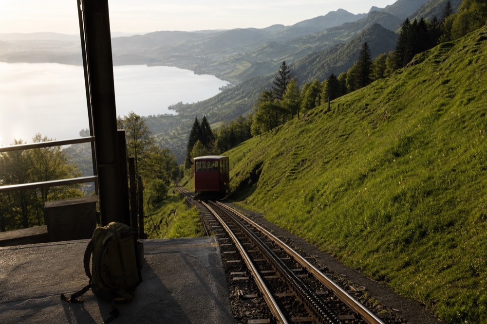 The cogwheel railway descending from Pilatus toward the lake at Alpnachstad, no text, no logos, no people